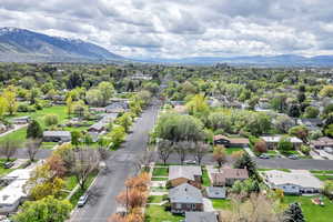 Drone / aerial view with a residential view and a mountain view