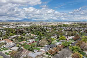 Drone / aerial view featuring a mountain view and a residential view