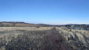 Property view of mountains featuring a rural view