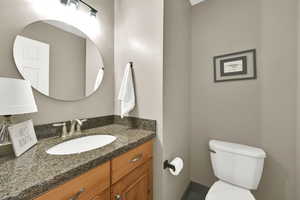 Bathroom with toilet and vanity