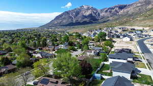 Aerial view featuring a residential view and a mountain view