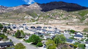 Drone / aerial view with a residential view and a mountain view