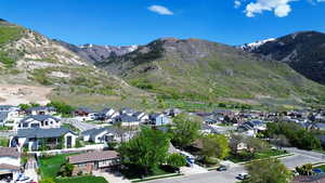 Property view of mountains featuring a residential view