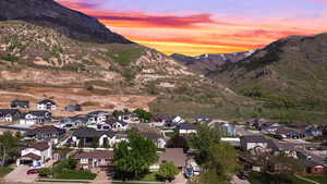Drone / aerial view featuring a residential view and a mountain view