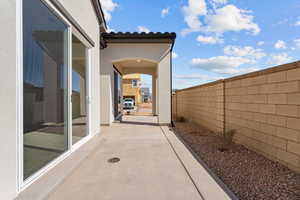 View of patio with fence