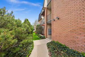 View of side of property with brick siding