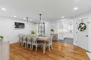 Dining area featuring recessed lighting and wood finished floors