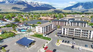 Birds eye view of property with a mountain view