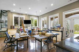 Dining area featuring recessed lighting, crown molding, and french doors