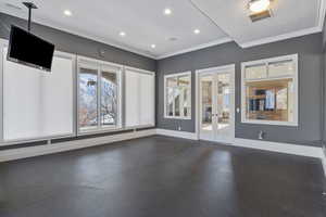 Spare room with baseboards, french doors, recessed lighting, and visible vents