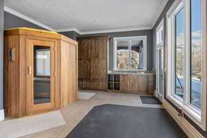 Interior space with plenty of natural light and light wood-style floors