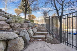 Exterior space with fence and a gate