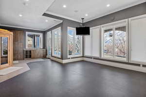 Interior space featuring recessed lighting, baseboards, and a healthy amount of sunlight