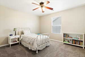 Bedroom with walk-in closet