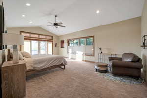 Primary bedroom, Carpeted, featuring baseboards, a ceiling fan, recessed lighting, and lofted ceiling.