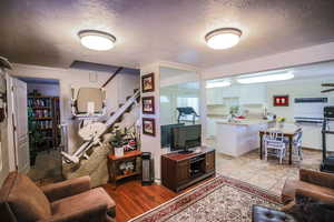 Living area with a textured ceiling