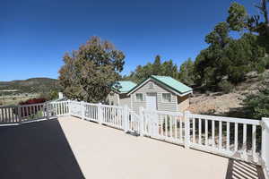 View of patio / terrace featuring an outbuilding