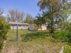 View of yard with fence