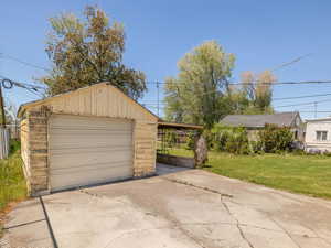 Garage with a garage and driveway