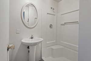 Full bathroom featuring walk in shower