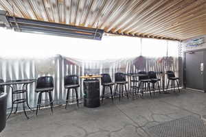 View of patio / terrace featuring outdoor dry bar