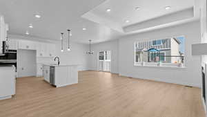 Kitchen featuring recessed lighting, appliances with stainless steel finishes, and light wood finished floors