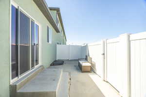 View of patio featuring a fenced backyard