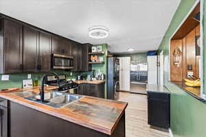 Kitchen Area facing Laundry/Utility.
