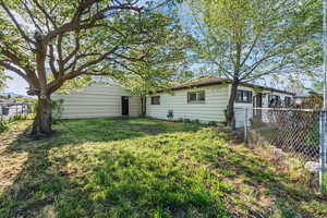 Side Yard on South Side of Home With Access to RV Pad.