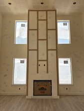 Interior space with baseboards and light wood-type flooring