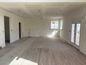 Unfurnished room with wood finished floors