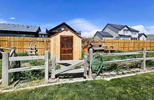 Backyard garden area and storage shed