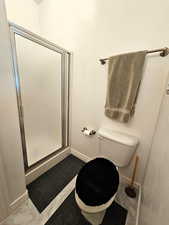 3/4 bathroom near kitchen and garage