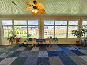 Sunroom/living space viewing the backyard