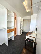 Spacious primary walk-in closet