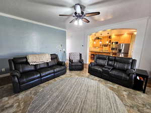 Family room looking into kitchen to the left leads to entry