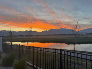 View of mountain backdrop featuring a large body of water