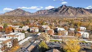 View of mountain backdrop with nearby suburban area