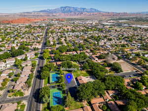 Birds eye view of property featuring a residential view and a mountain view