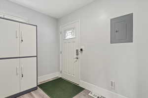 ENTRY AND MUDROOM FROM CARPORTS  COVERED PARKING  2 STALLS