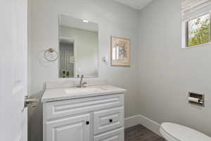 1/2 BATH BY MUDROOM AND LAUNDRY