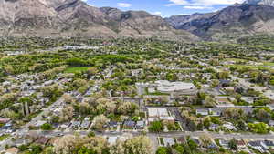 Drone / aerial view featuring a residential view and a mountain view