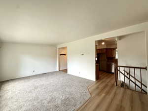 Empty room with light wood-style floors