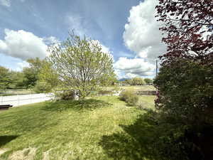 View of yard with fence