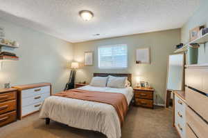 Bedroom has room for desk and dressers