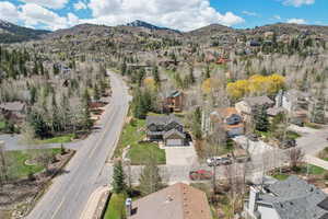 Drone / aerial view featuring a mountain view and a residential view