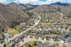 Birds eye view of property featuring a residential view and a mountain view