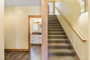 View into  full Bathroom 1 & Stairway to possible ADU