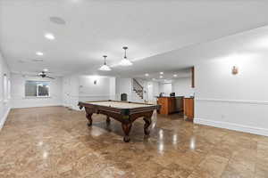 Recreation room with billiards, baseboards, and recessed lighting