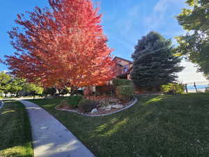 View of yard featuring fence